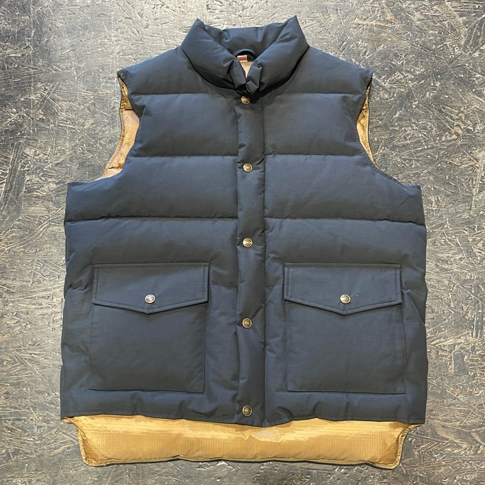 Brand new with tags Schott NYC down vest. Black on one side and tan rip stop